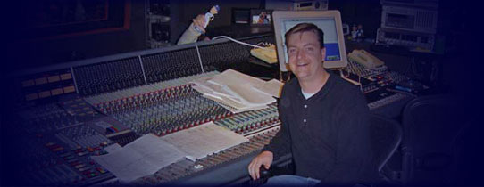 Sam works at a mixing console